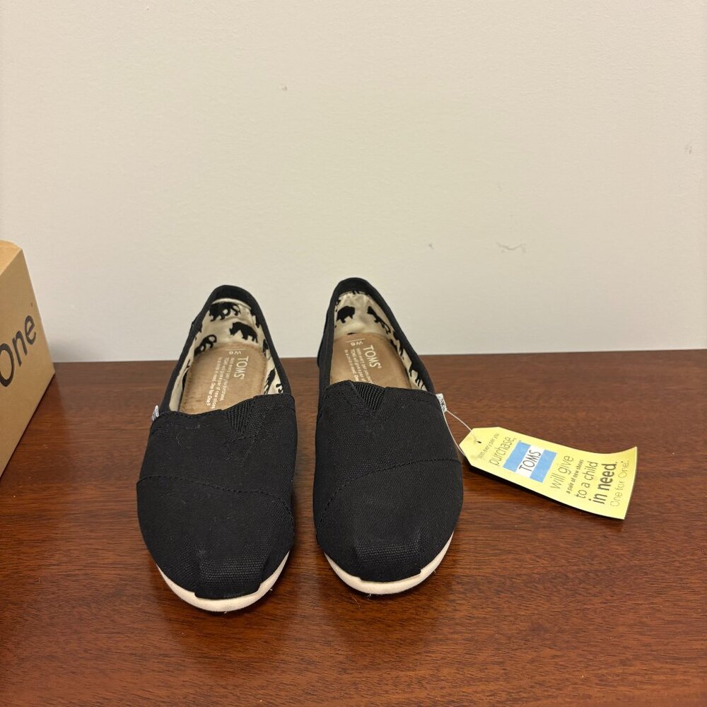 Toms Classic Black flat slip ons
